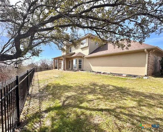 a house with trees in front of it