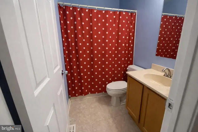 a bathroom with bathtub and shower