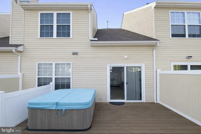 a backyard of a house with seating space