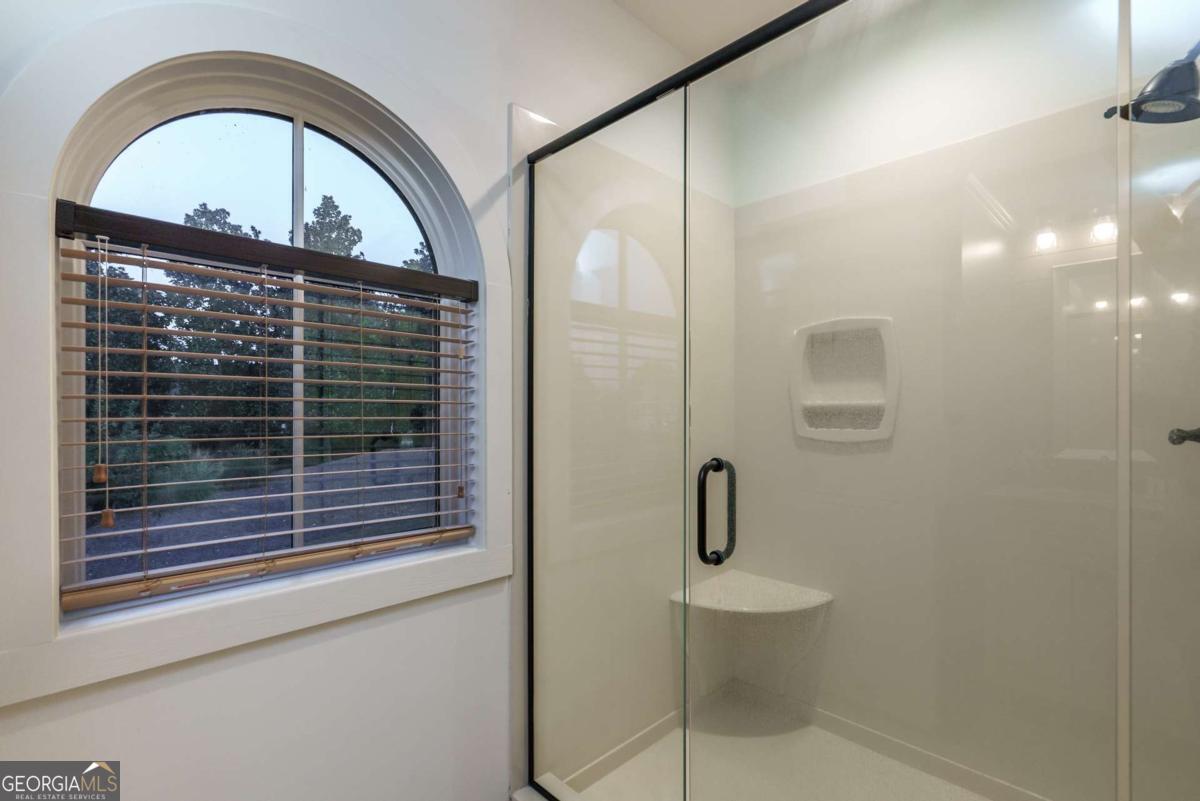 401 Cuscowilla Drive, Unit D Eatonton, GA 31024 - Photo 16 of 20 a view of bathroom with a toilet