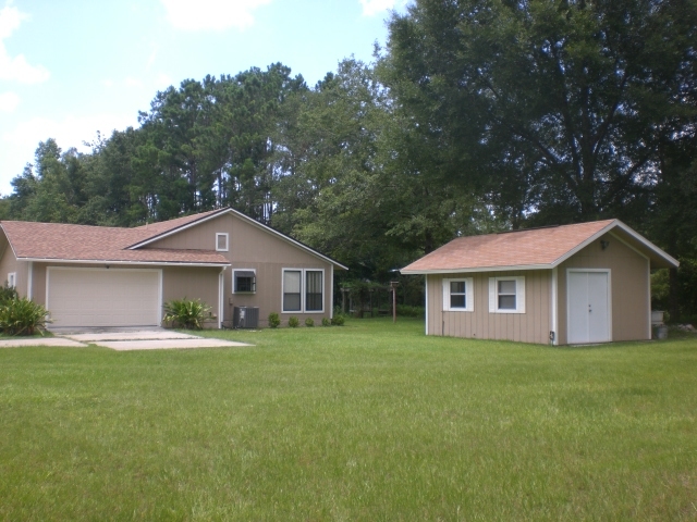 1095 Hiddenwoods Road Jacksonville, FL 32220 - Photo 28 of 36 Side Yard