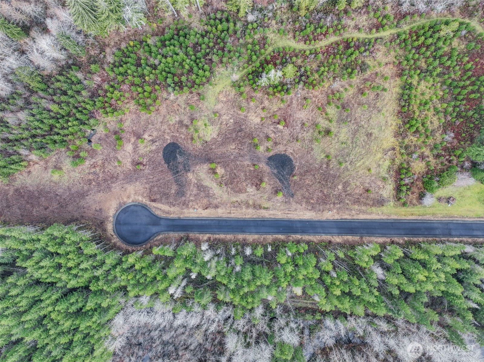 5 Larson Road McCleary, WA 98557 - Photo 3 of 26 a wooden bench sitting in a yard