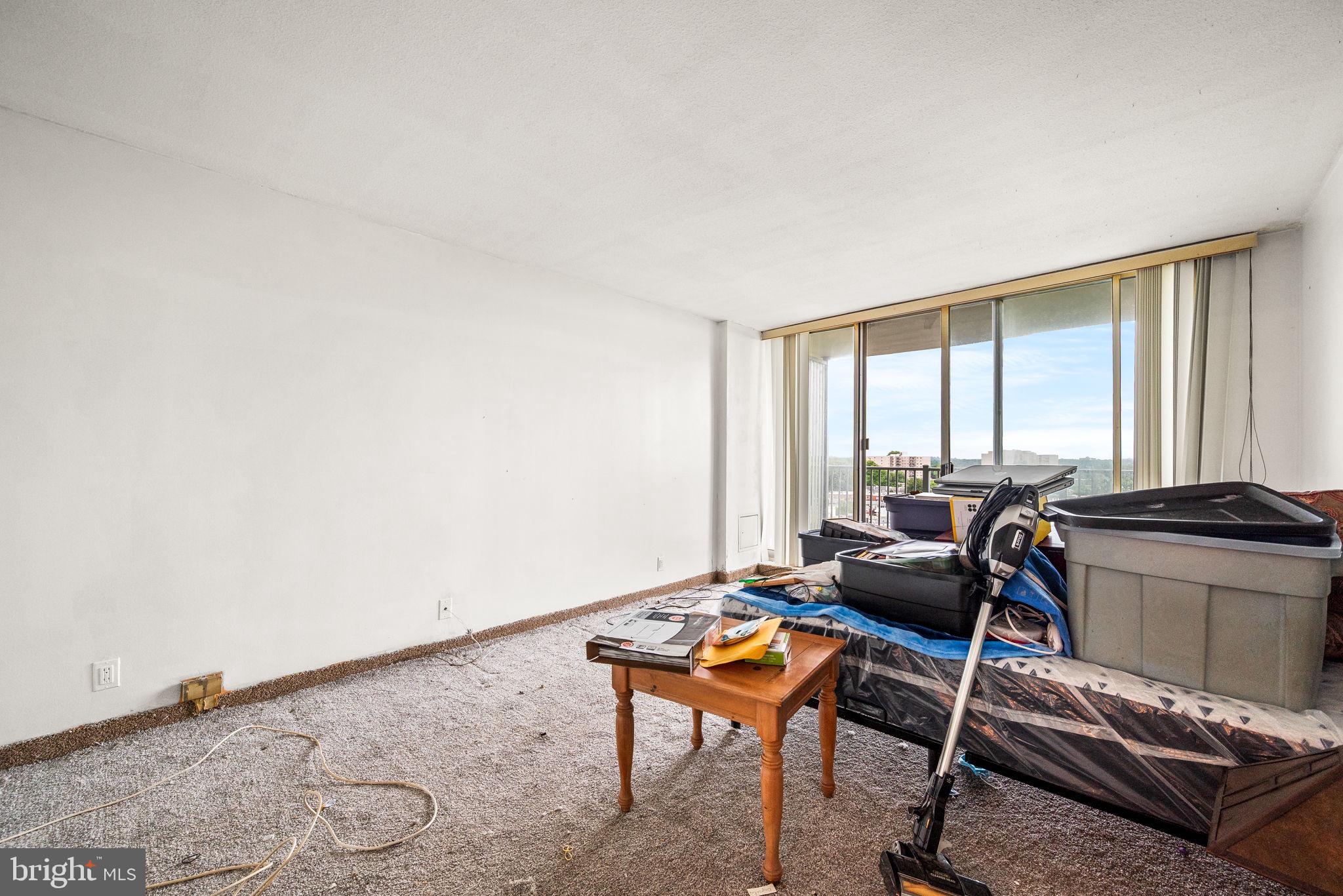 3900 West Ford Road, Unit 11B Philadelphia, PA 19131 - Photo 17 of 24 a room with gym equipment and a window