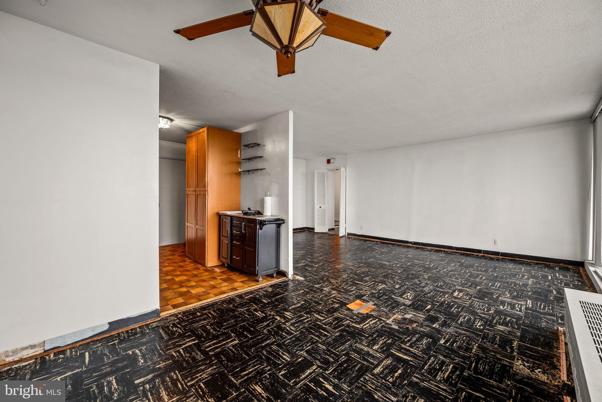 3900 West Ford Road, Unit 11B Philadelphia, PA 19131 - Photo 9 of 24 a view of a room with wooden floor