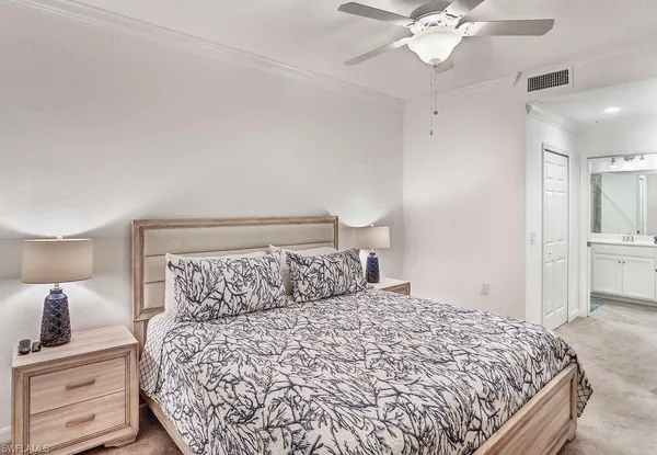 a bathroom with a double vanity sink a mirror and a shower