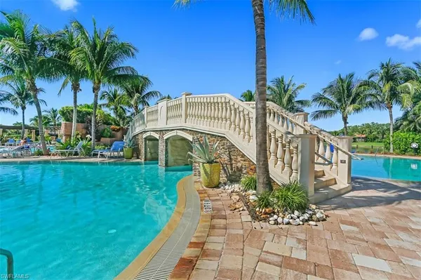 swimming pool with outdoor seating
