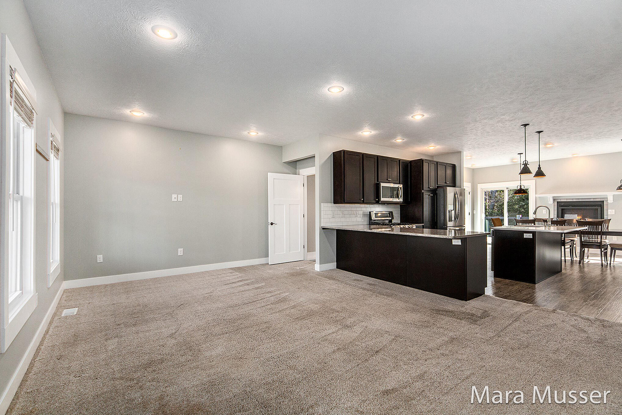 4061 Ronalds Road Dorr, MI 49323 - Photo 3 of 36 Living Room / Kitchen
