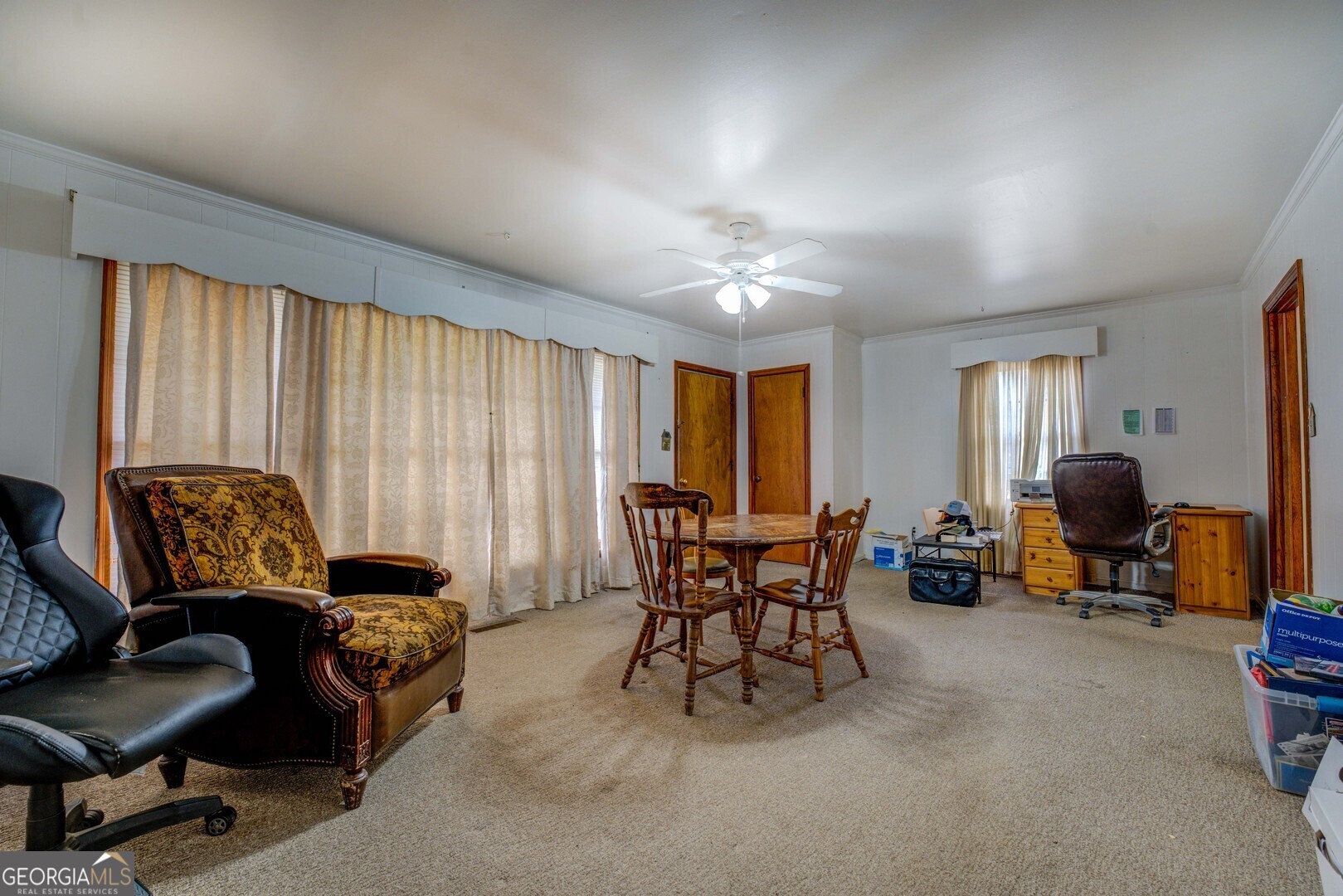 908 Nelson Street Jackson, GA 30233 - Photo 10 of 25 a view of a livingroom with workspace and a window