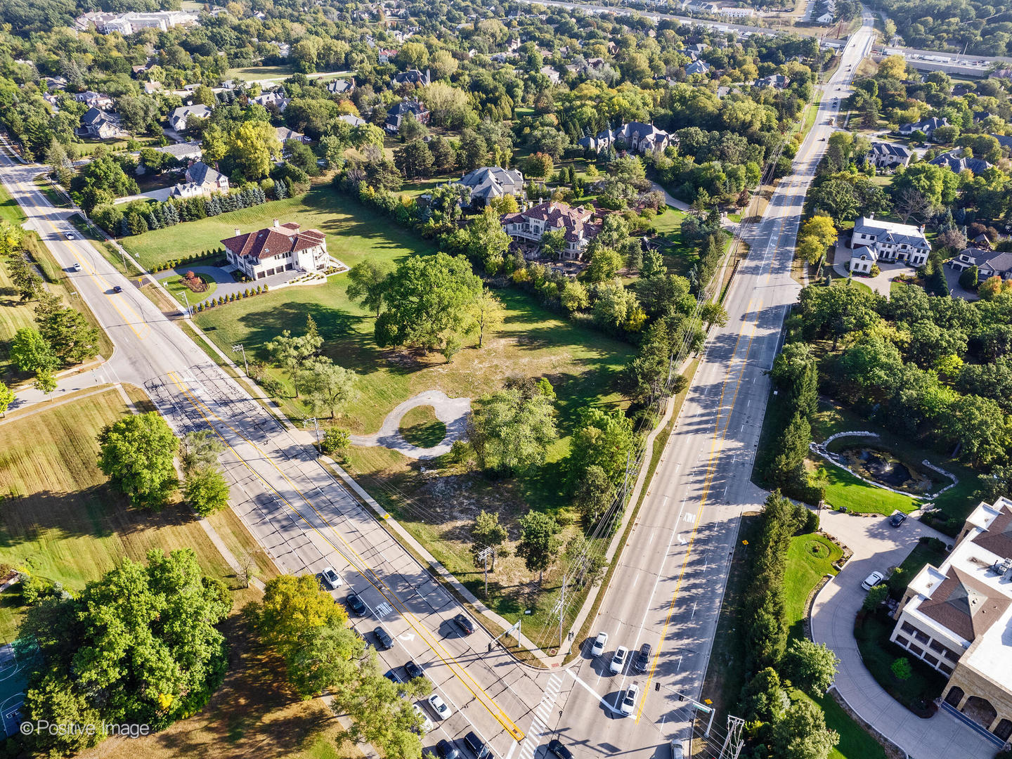 6401 South County Line Road Burr Ridge, IL 60527 - Photo 12 of 15 an aerial view of residential houses with outdoor space
