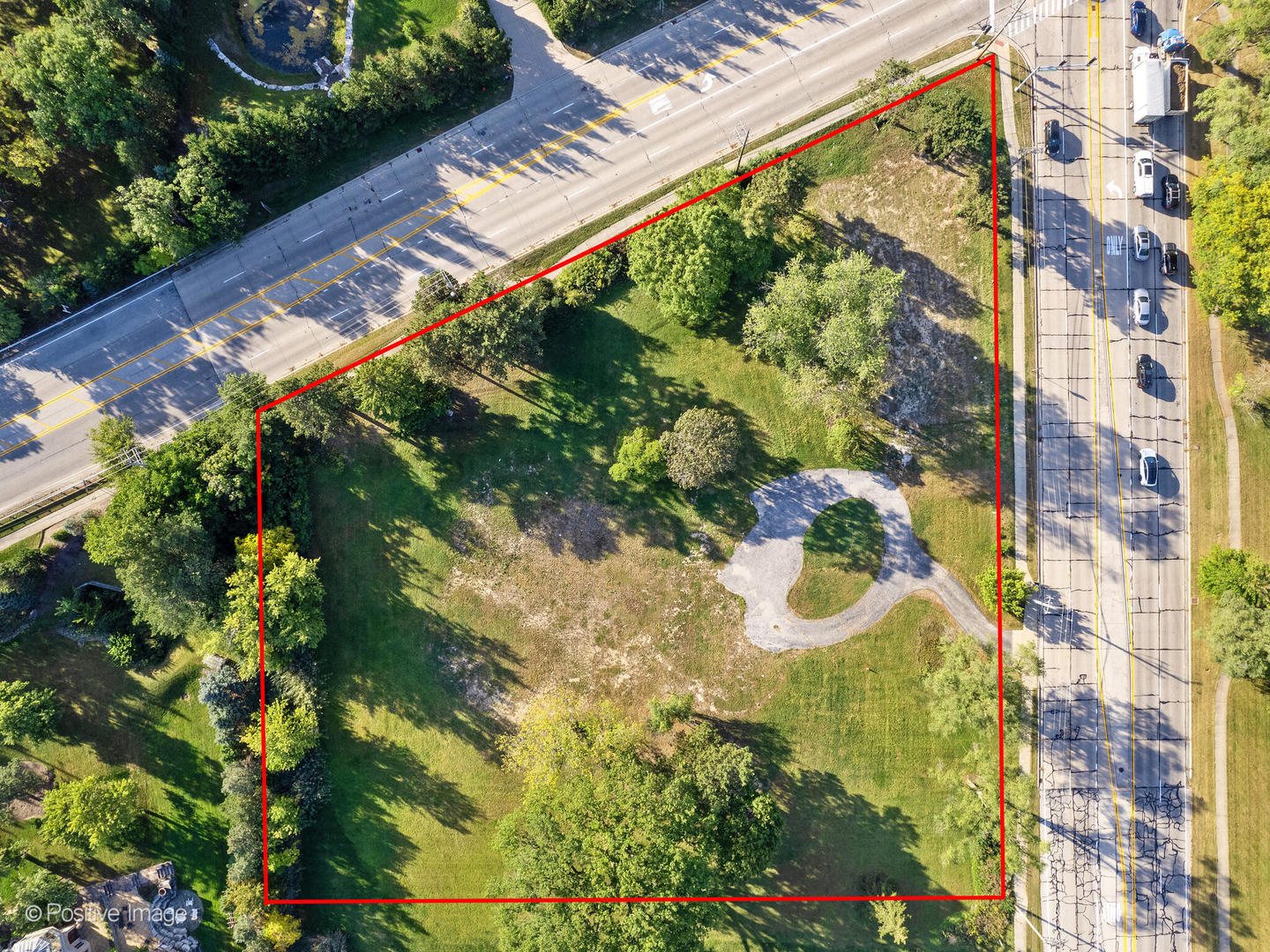 6401 South County Line Road Burr Ridge, IL 60527 - Photo 2 of 15 a close up of a flower in a garden