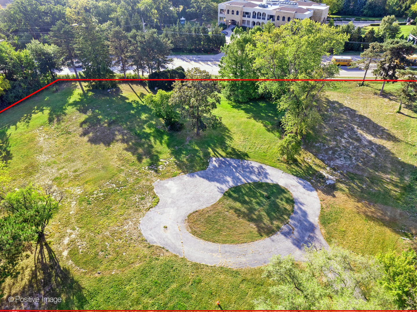 6401 South County Line Road Burr Ridge, IL 60527 - Photo 7 of 15 a view of a lake with a house in the background