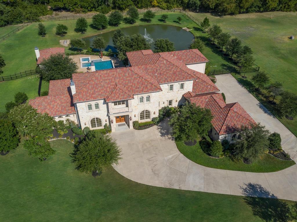 612 Manor Drive Argyle, TX 76226 - Photo 1 of 1 an aerial view of a house with outdoor space and lake view
