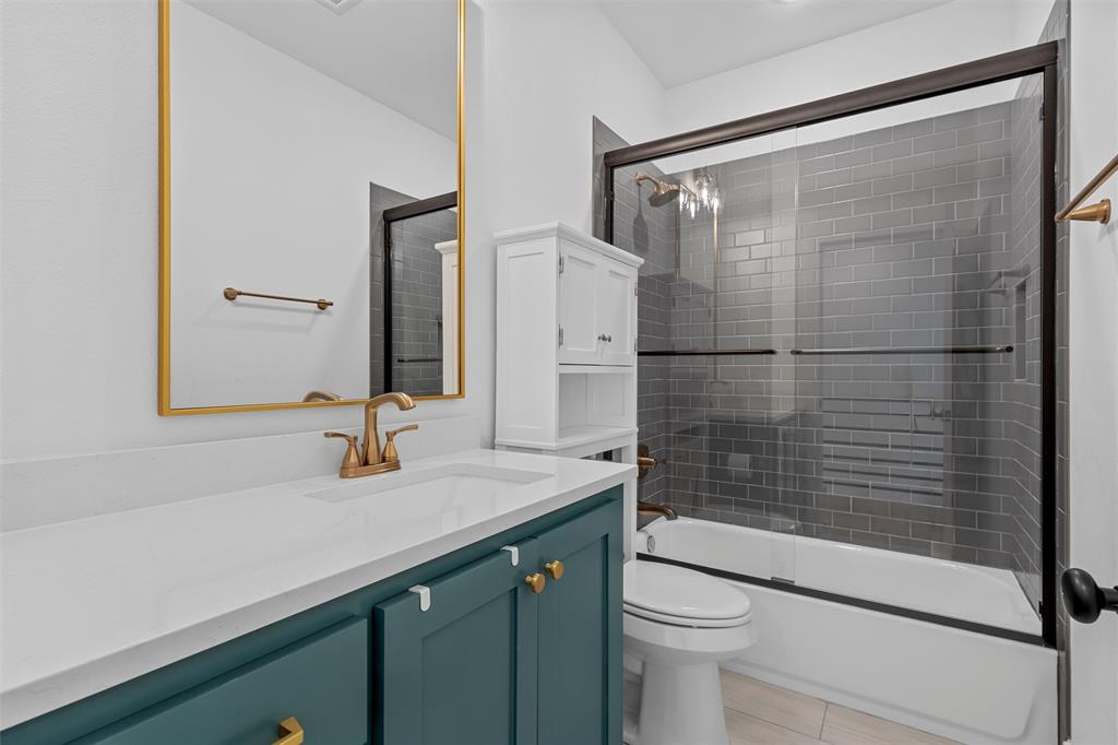 216 Wycliff Drive China Spring, TX 76633 - Photo 26 of 40 a bathroom with a sink and a mirror