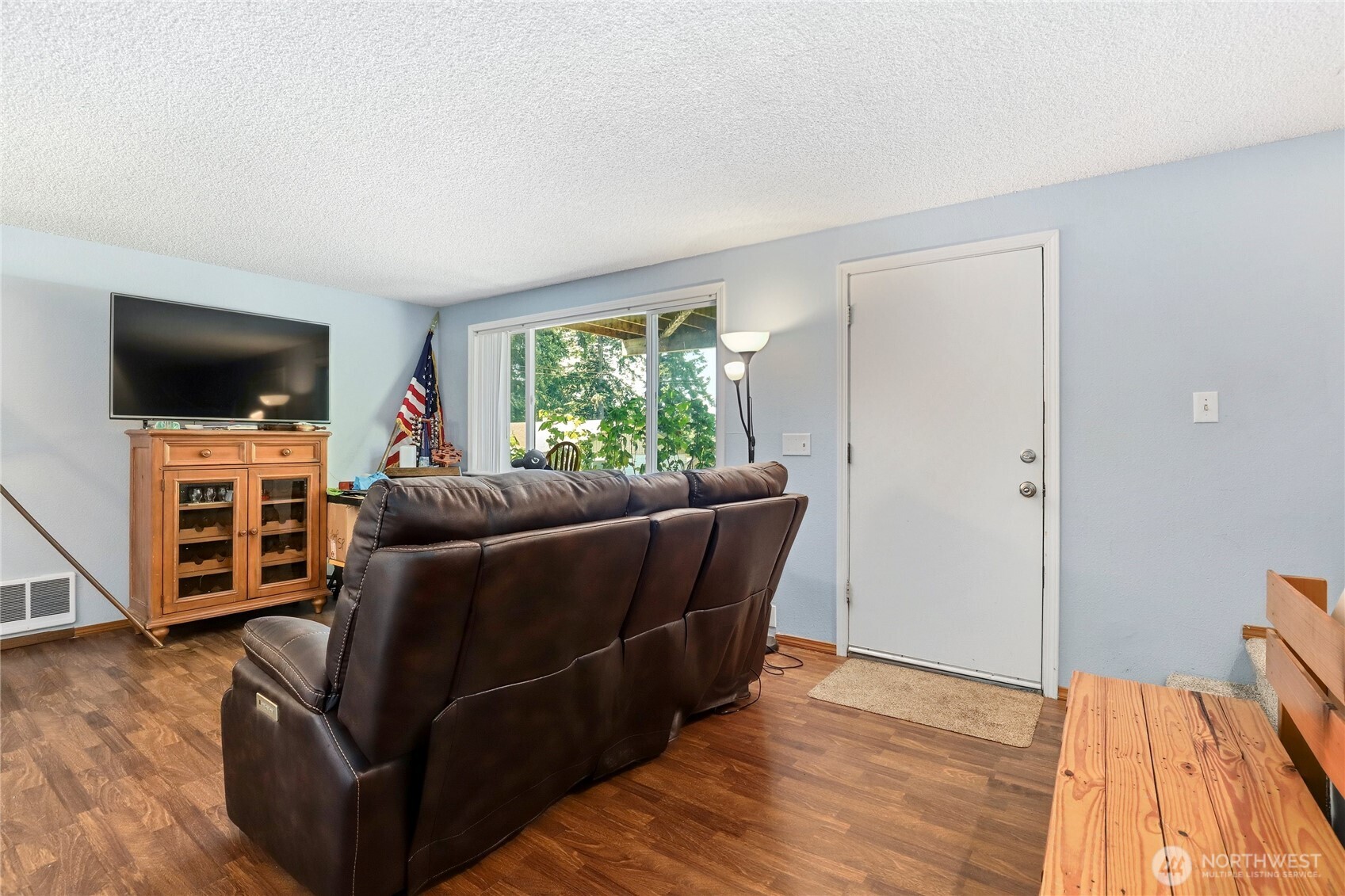 2533 Fir Avenue Bremerton, WA 98310 - Photo 22 of 38 a living room with furniture and a flat screen tv