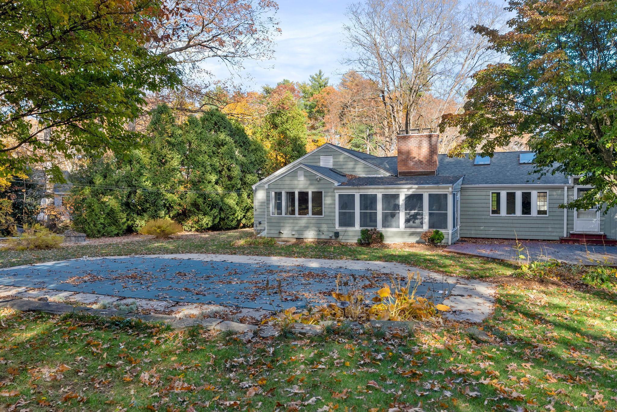 23 Wagon Road Glastonbury, CT 06033 - Photo 35 of 40 a front view of a house with a yard