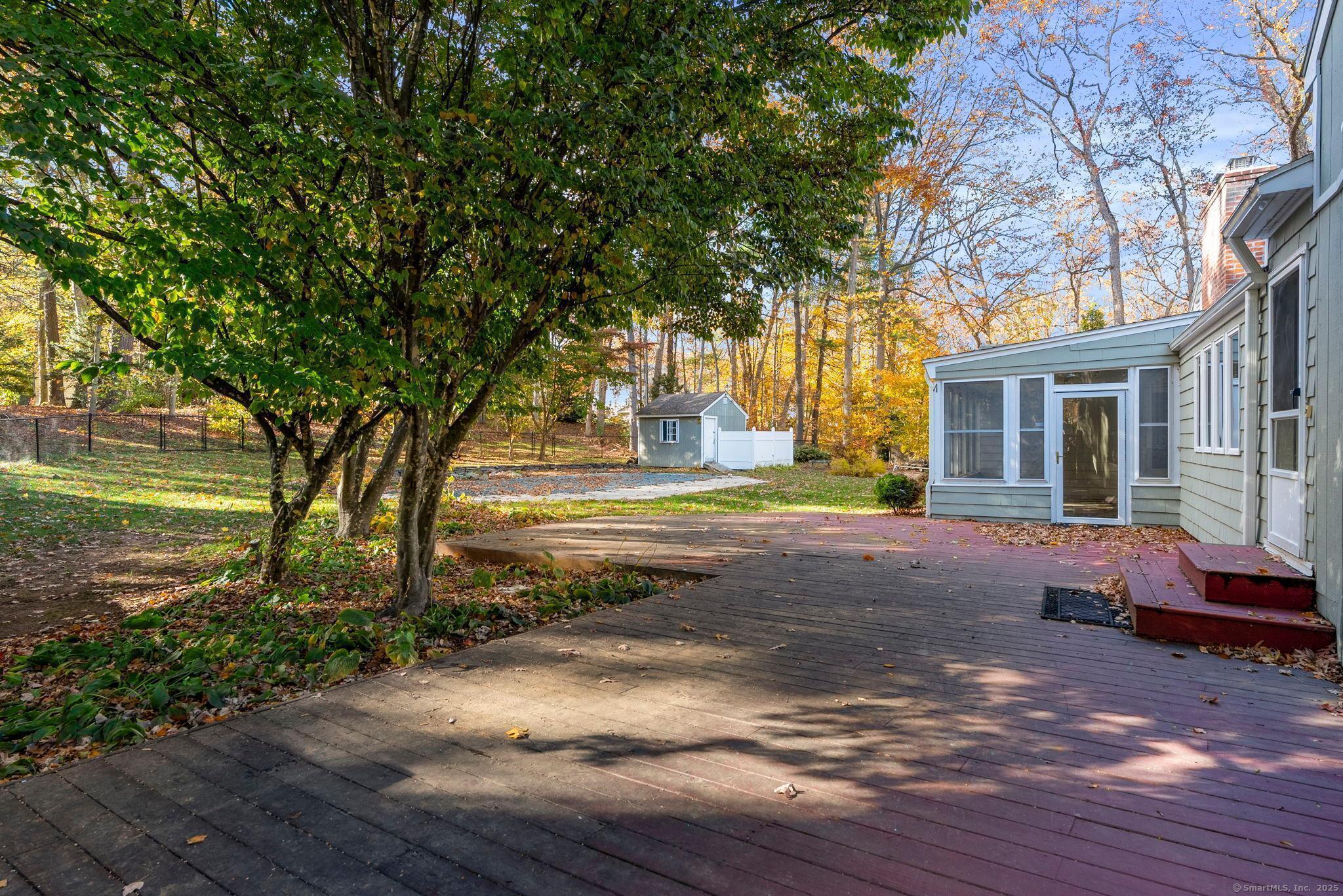 23 Wagon Road Glastonbury, CT 06033 - Photo 37 of 40 a view of backyard of house with green space