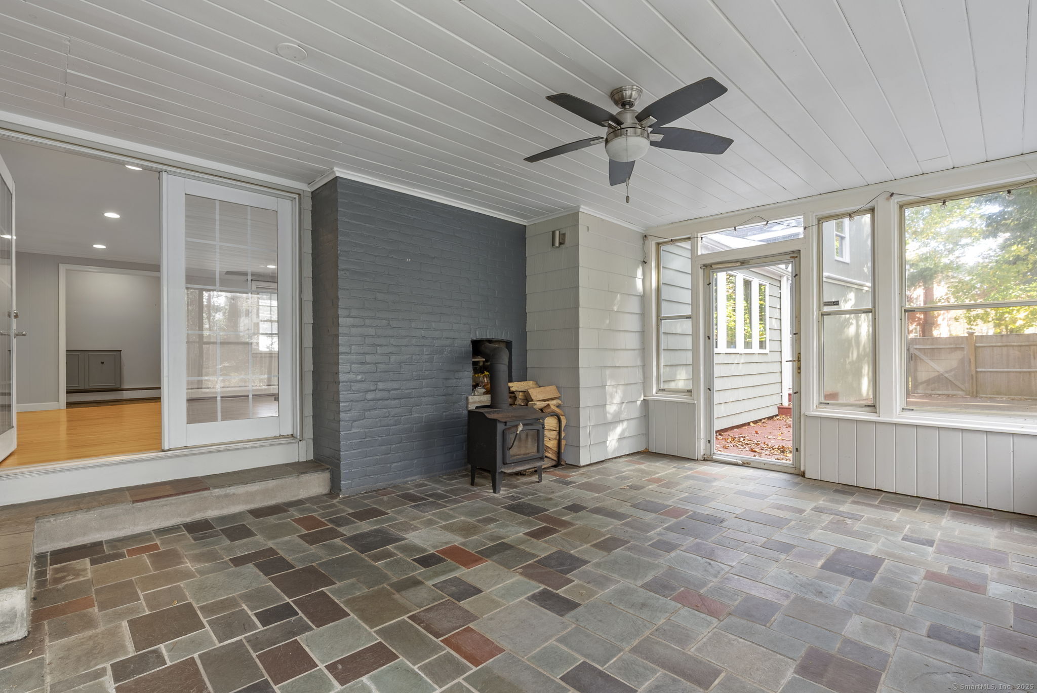 23 Wagon Road Glastonbury, CT 06033 - Photo 6 of 40 a view of a livingroom with a ceiling fan and window