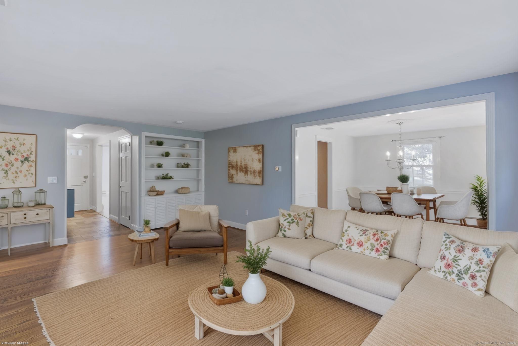 23 Wagon Road Glastonbury, CT 06033 - Photo 10 of 40 a living room with furniture and a wooden floor