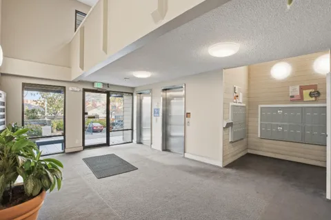 a view of empty room with front door