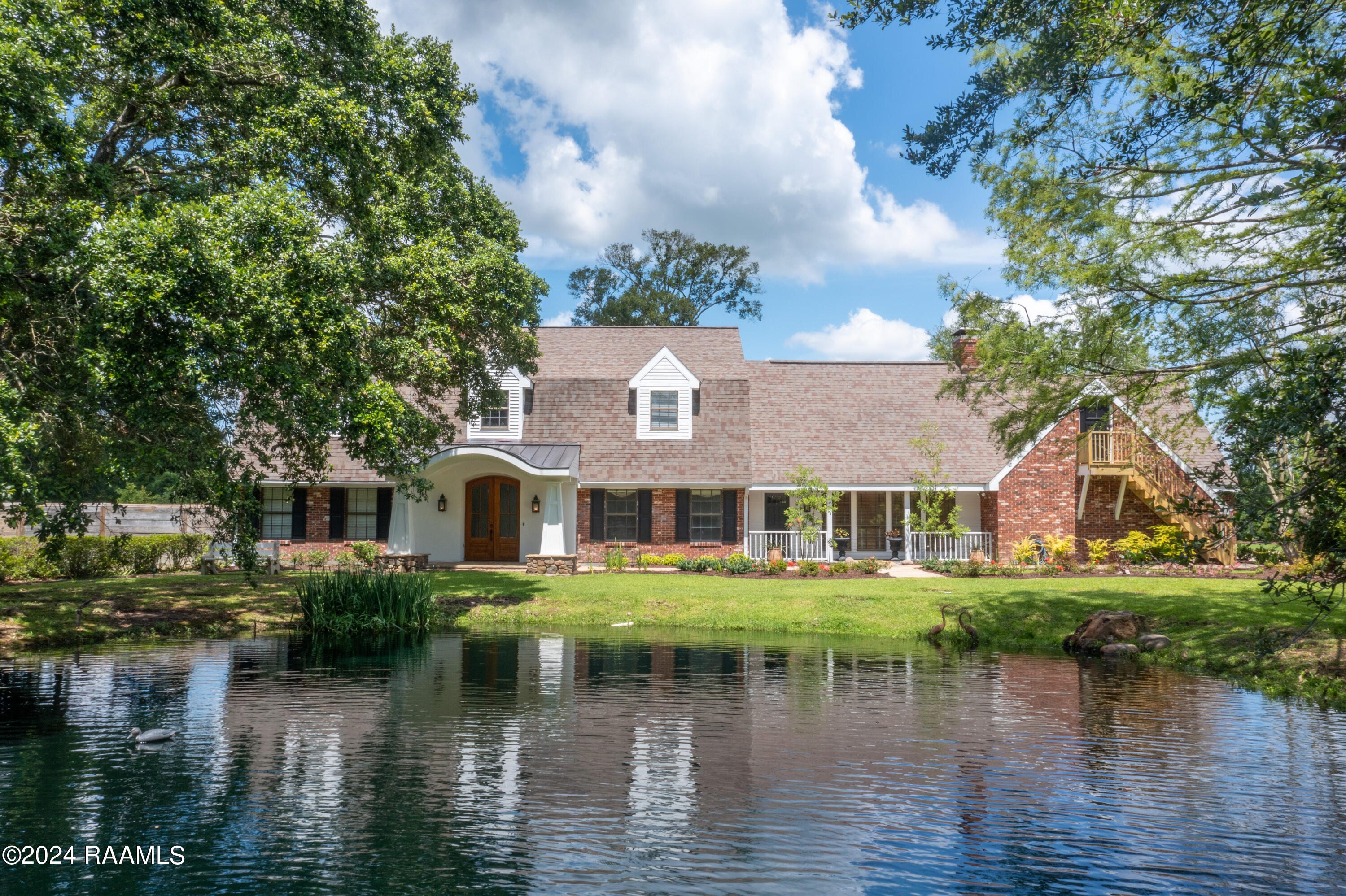 Frontage View with Stocked Pond