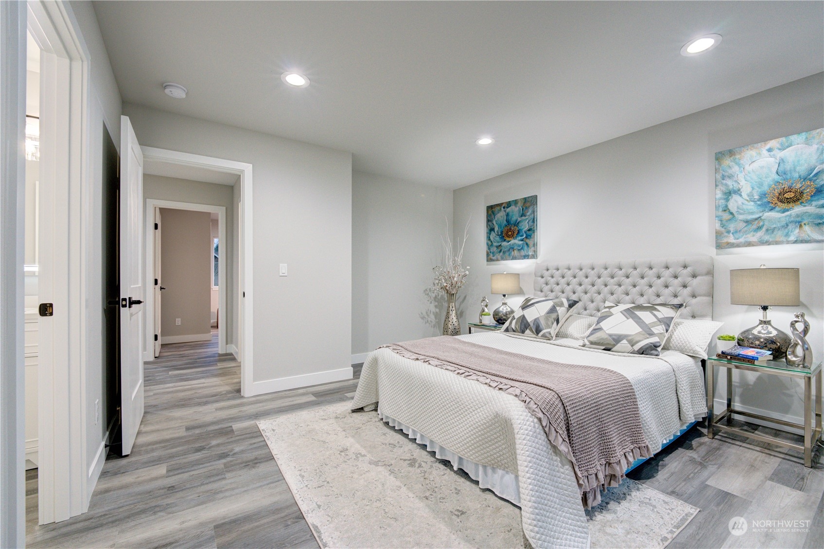 1861 Watkins Road Freeland, WA 98249 - Photo 8 of 39 a bedroom with a bed and a painting