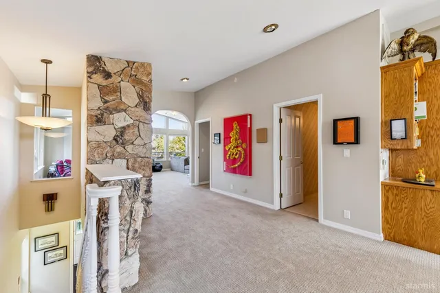 a view of livingroom with furniture and windows