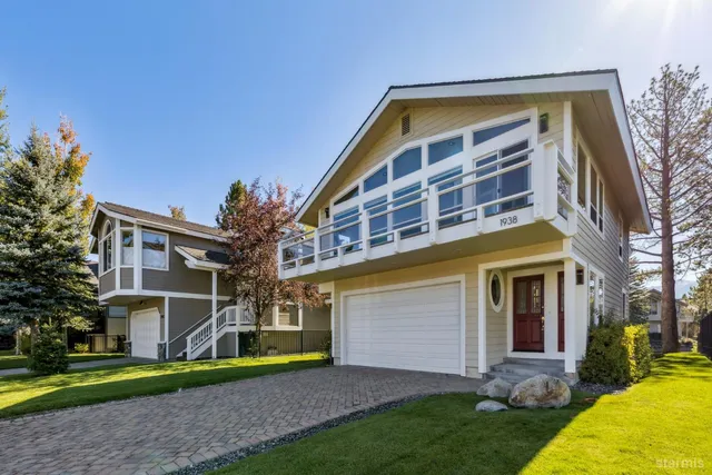 a view of a building with a yard