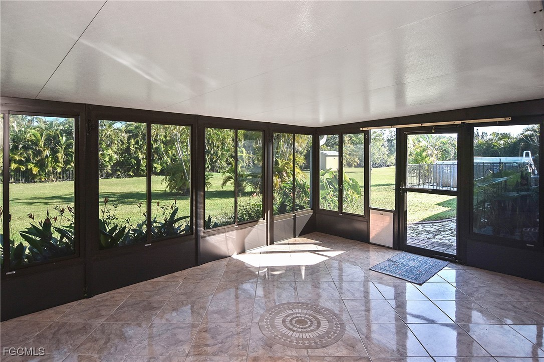 4658 Gulf Shore Road St. James City, FL 33956 - Photo 26 of 50 a view of an empty room with a large window