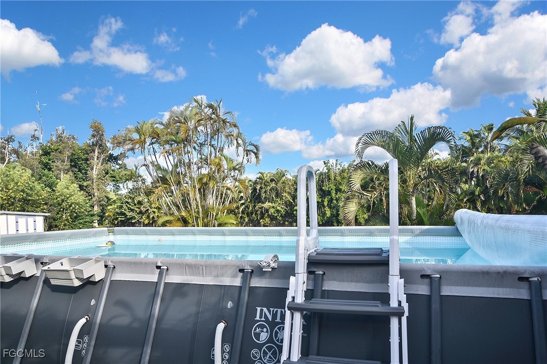 4658 Gulf Shore Road St. James City, FL 33956 - Photo 40 of 50 a view of outdoor space with seating area