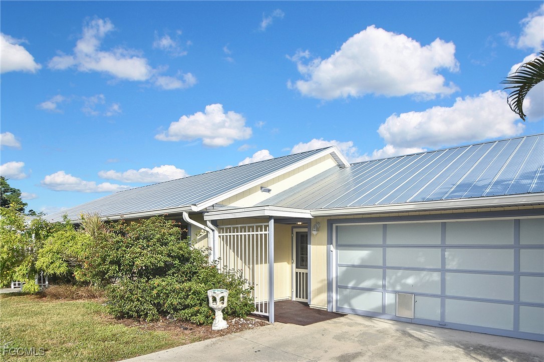 4658 Gulf Shore Road St. James City, FL 33956 - Photo 8 of 50 a front view of a house