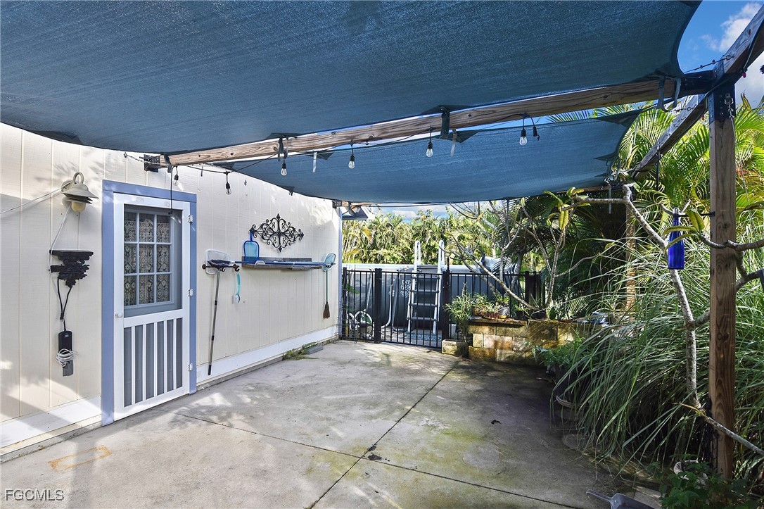 4658 Gulf Shore Road St. James City, FL 33956 - Photo 9 of 50 a view of a garage