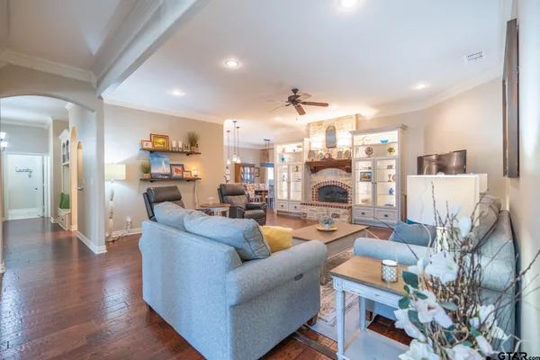 a kitchen with stainless steel appliances a refrigerator sink and cabinets