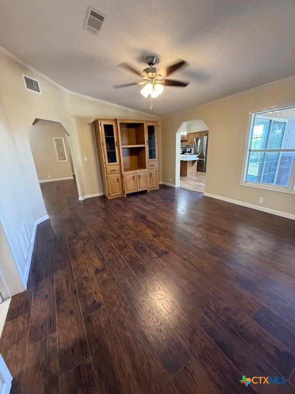 4551 Chamberlain Way Canyon Lake, TX 78133 - Photo 13 of 34 a view of a livingroom with wooden floor and ceiling fan