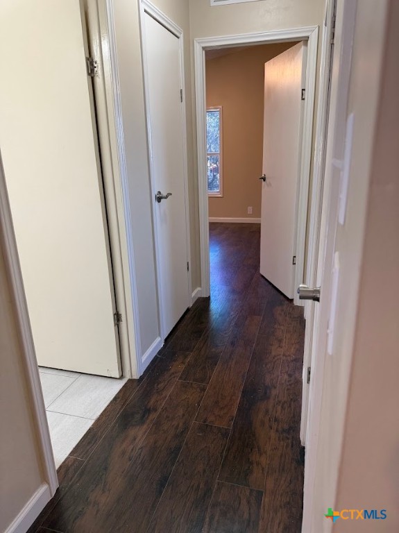 4551 Chamberlain Way Canyon Lake, TX 78133 - Photo 21 of 34 an empty room with wooden floor and entrance