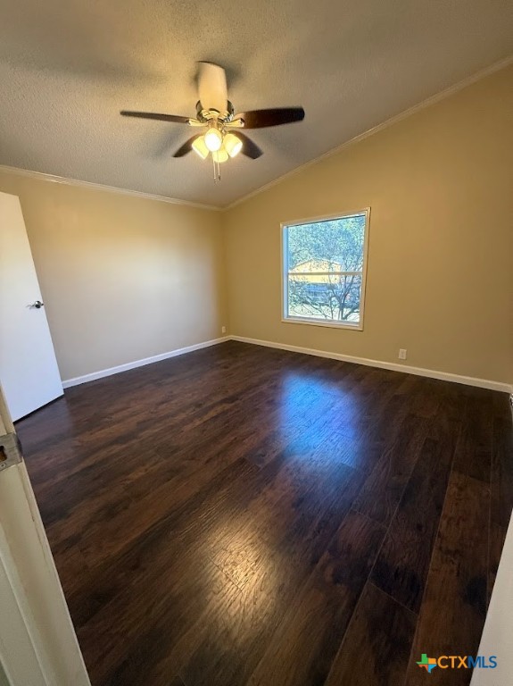 4551 Chamberlain Way Canyon Lake, TX 78133 - Photo 25 of 34 an empty room with wooden floor chandelier fan and windows