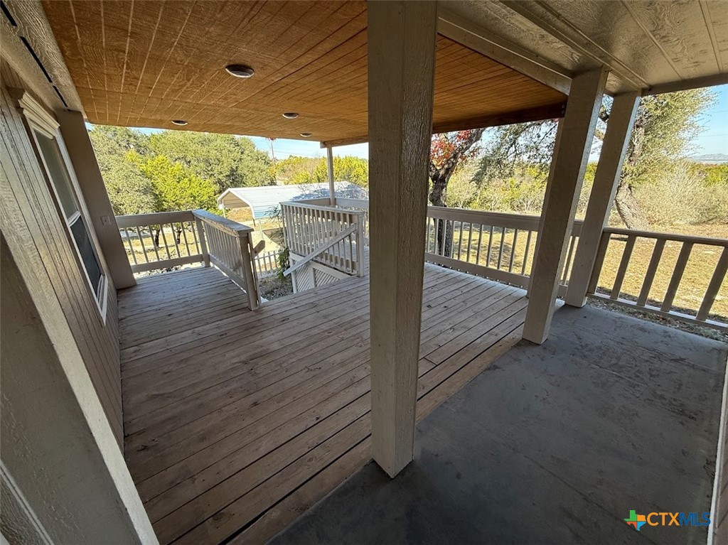 4551 Chamberlain Way Canyon Lake, TX 78133 - Photo 8 of 34 a view of an outdoor space with seating area