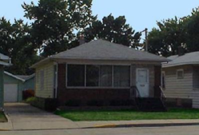 428 165th Street Hammond, IN 46324 - Photo 1 of 1 a front view of a house with a garden