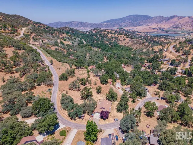 an aerial view of mountain with an outdoor space