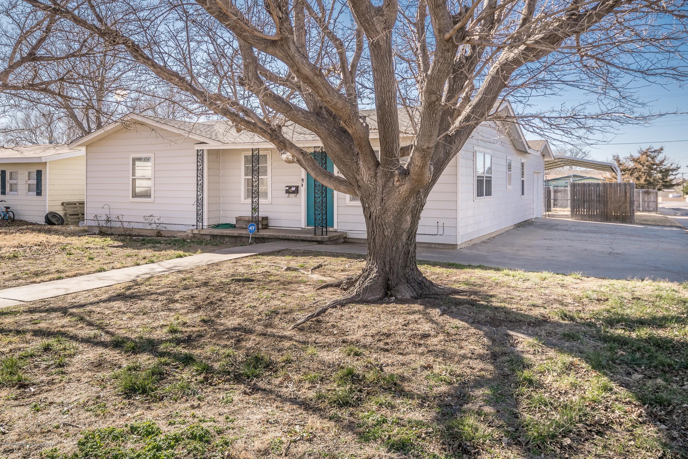 4200 South Bonham Street Amarillo, TX 79110 - Photo 20 of 20 a view of a yard with a tree
