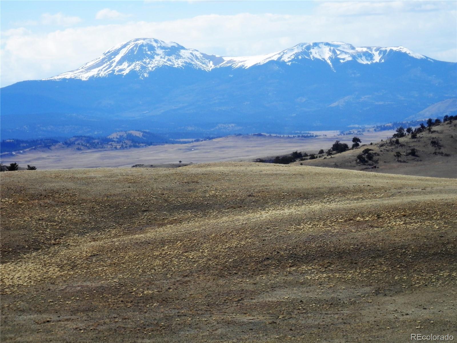 4464 Chickasaw Road Hartsel, CO 80449 - Photo 1 of 9 a view of an ocean with a mountain
