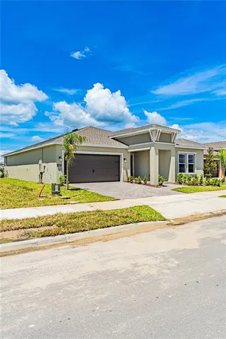 a view of swimming pool with an outdoor seating