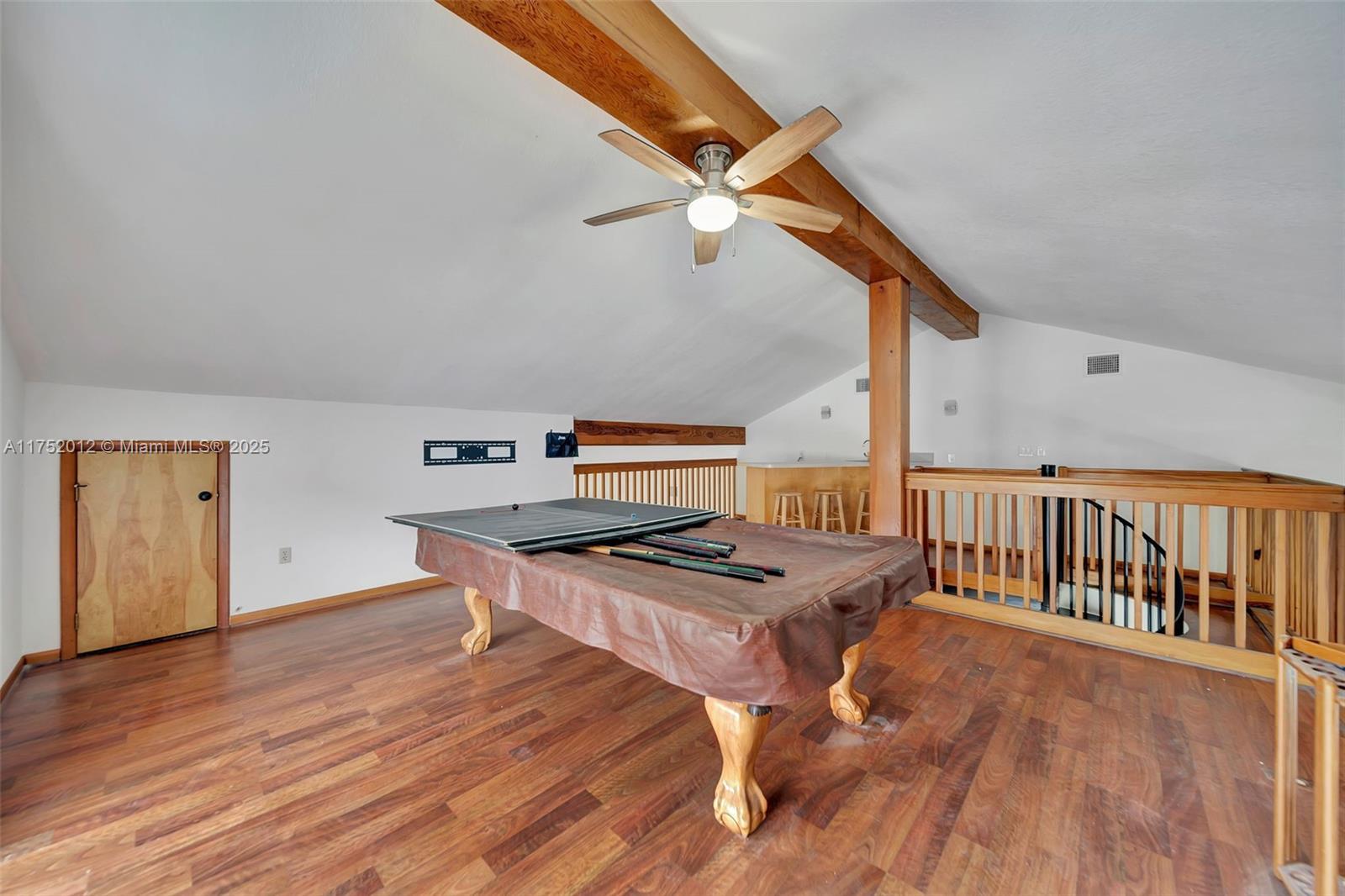 15006 Southwest 141st Court Miami, FL 33186 - Photo 7 of 27 a room with furniture and wooden floor