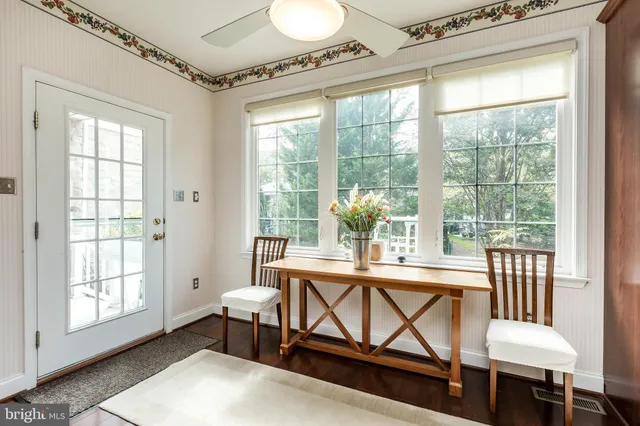 a spacious bedroom with a bed and a couch