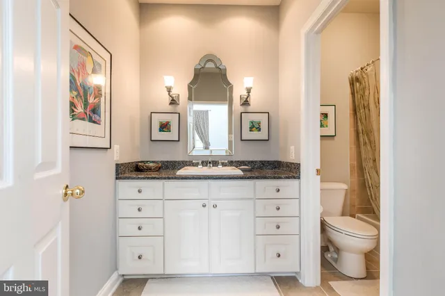 a view of a backyard with large trees