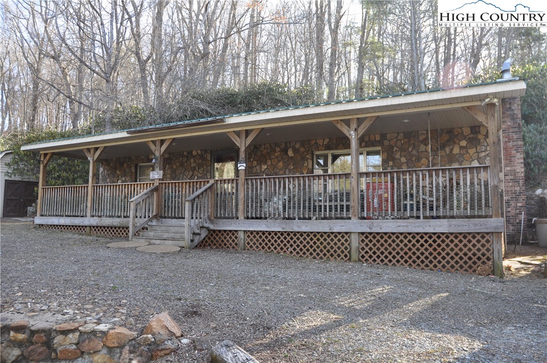 a view of outdoor space with wooden fence
