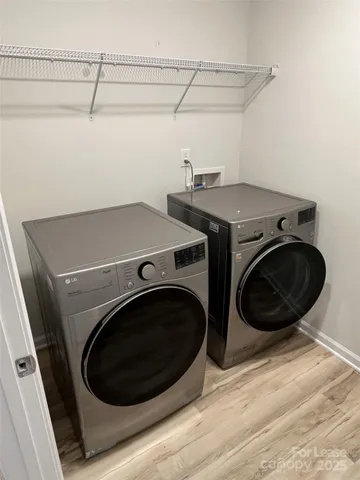 a utility room with dryer and washer