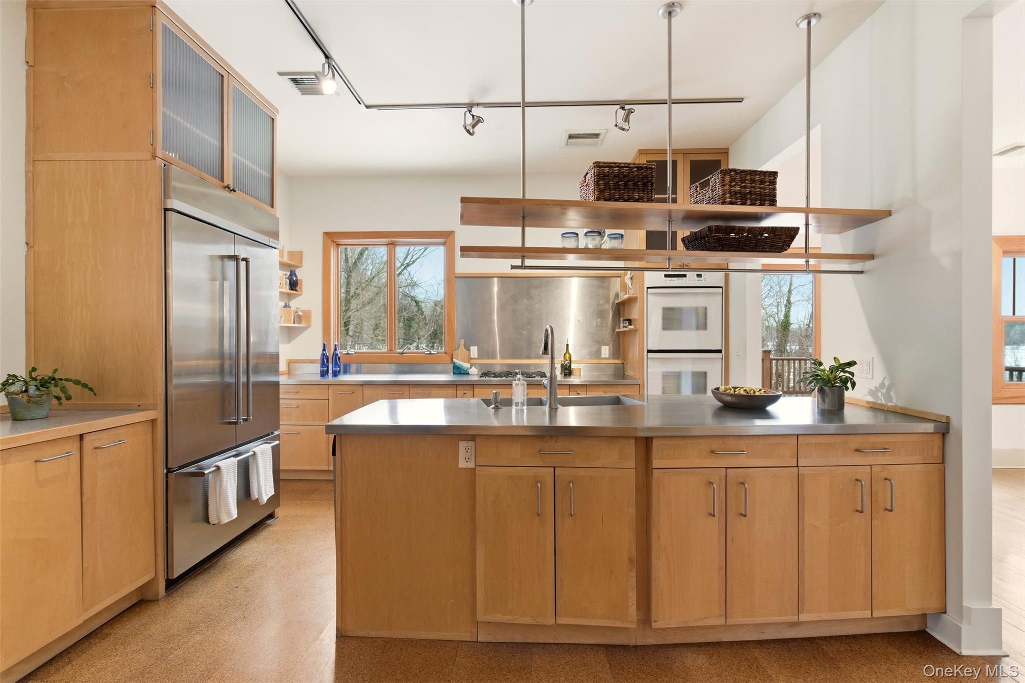 7 Landing Road Huntington, NY 11743 - Photo 11 of 42 a kitchen with counter top space and stainless steel appliances