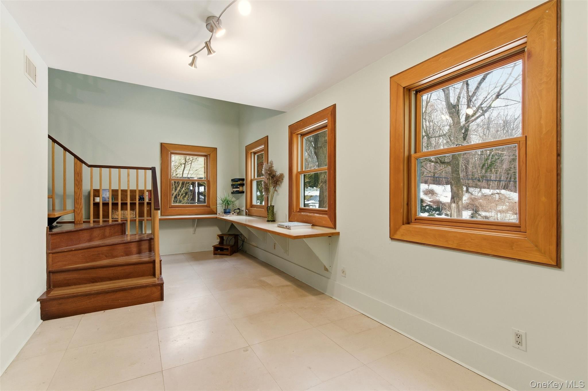7 Landing Road Huntington, NY 11743 - Photo 24 of 42 a living room with furniture and a large window