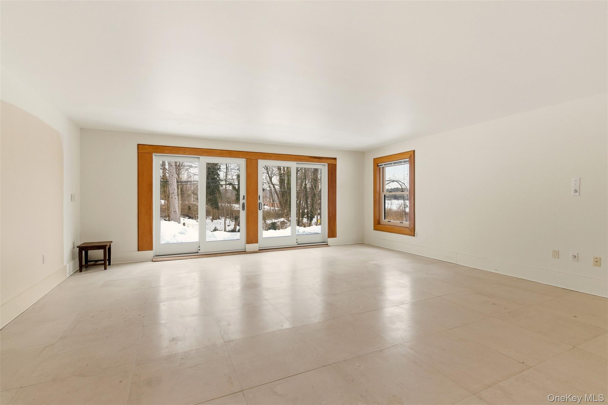 7 Landing Road Huntington, NY 11743 - Photo 27 of 42 an empty room with windows and city view
