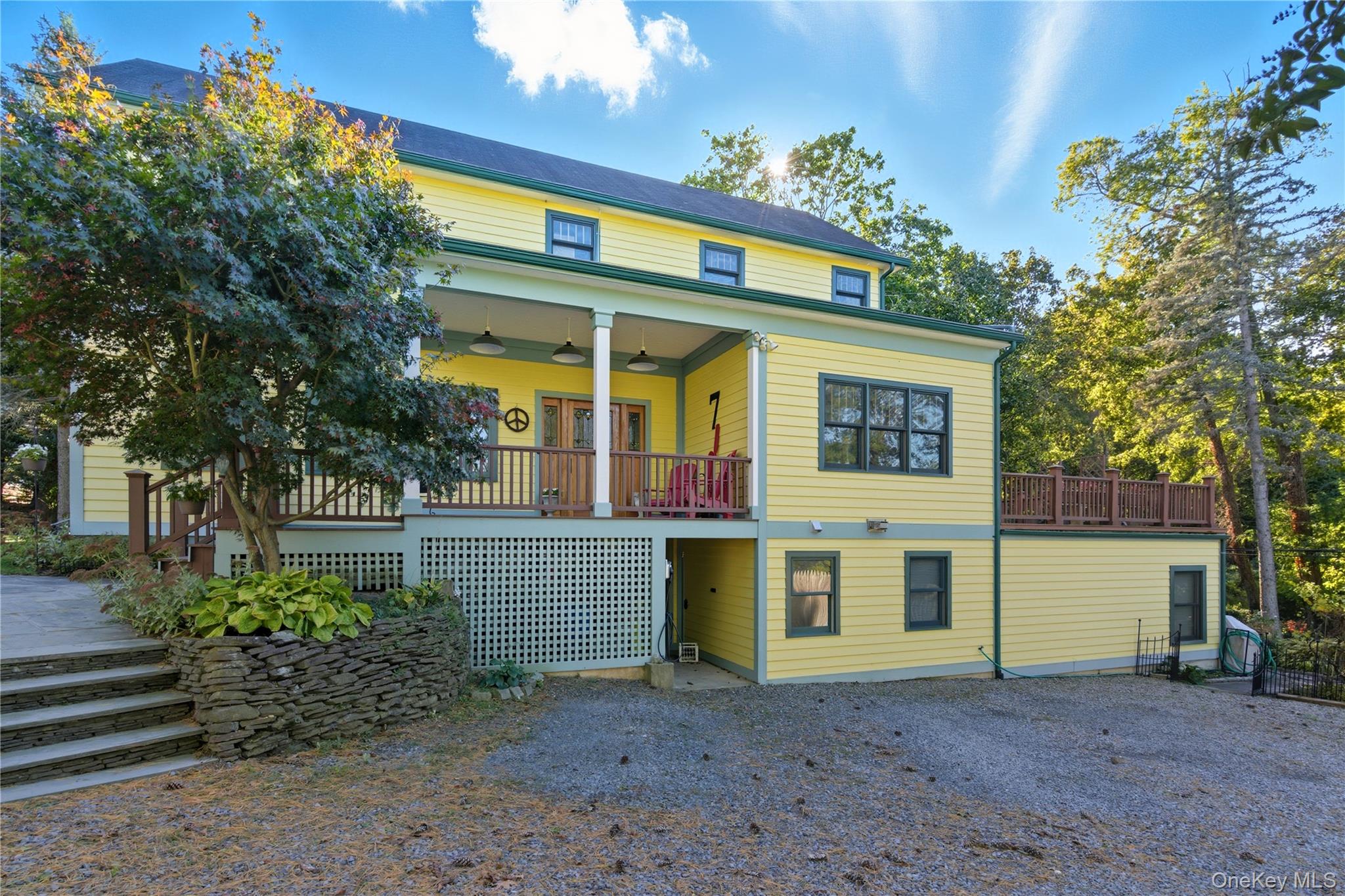 7 Landing Road Huntington, NY 11743 - Photo 5 of 42 a view of a house with a yard and plants